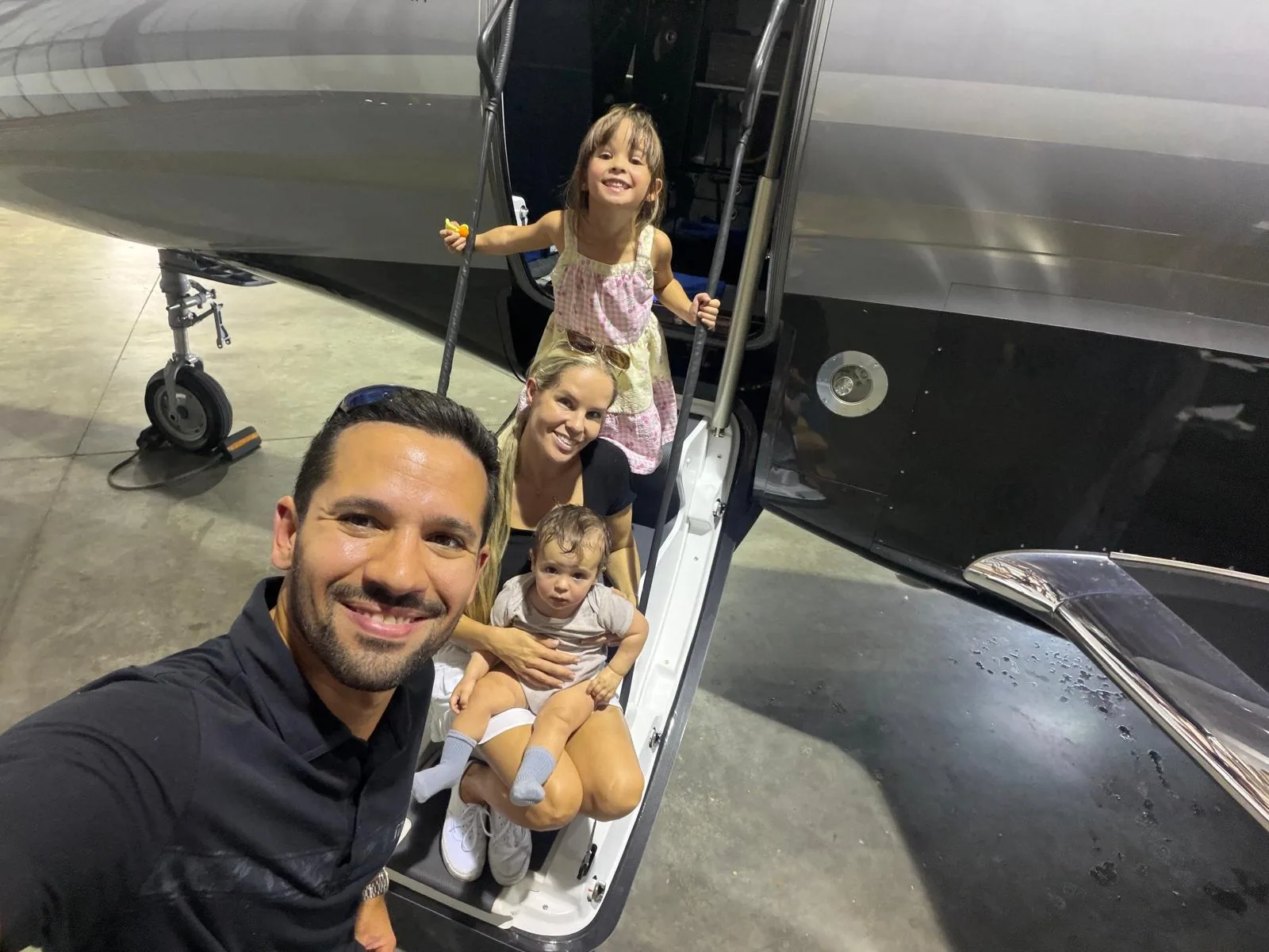 The Martinez family at the aircraft